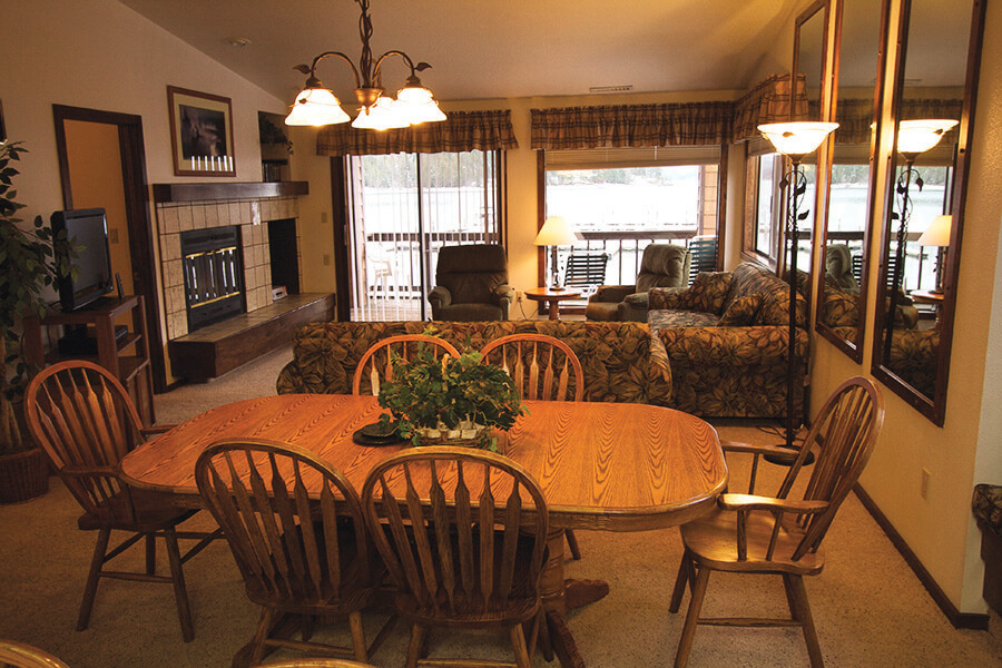 An expansive dining and living room at VRI's Pend Oreille Shores Resort in Hope, Idaho.